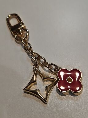 Gold-tone Charm Keychain with Red Flower Accent